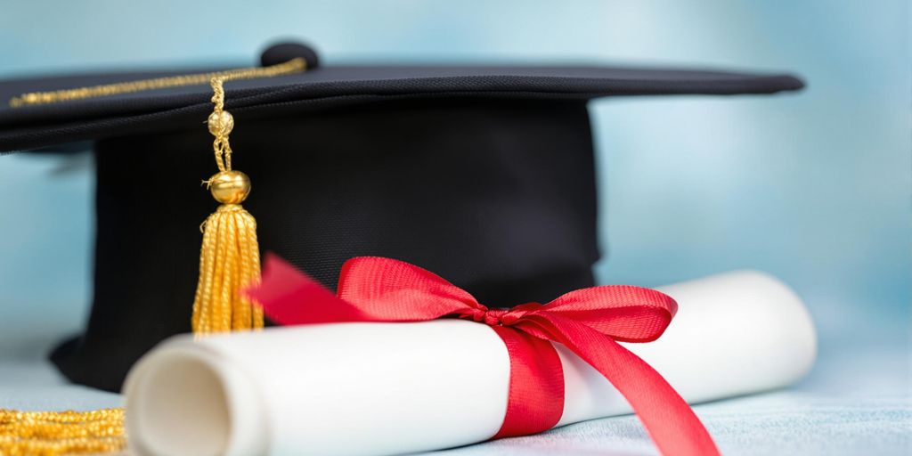 Graduation cap and diploma.