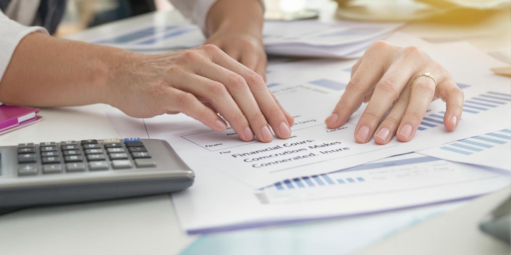 Tax preparer organizing documents.