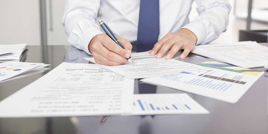 A person reviewing financial documents.